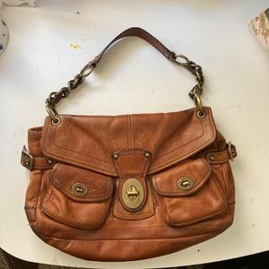 Brown coach cargo bag.
